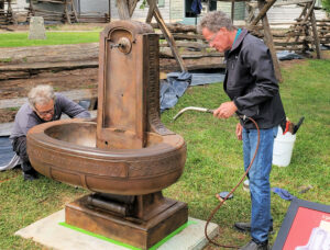 workmen at the Jamestown GSCW Horse Trough